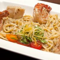 Seafood Linguine  · Scallops and jumbo shrimp in a sherry lobster sauce with heirloom tomato, lemon zest and cil...