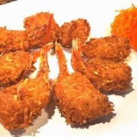 4 Pieces Coconut Shrimp · Fresh shrimp dipped in a batter of shredded coconut and deep-fried.
