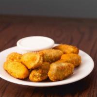 Jalapeno Poppers · Cheddar filled jalapenos served with ranch dressing.