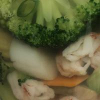 Seafood Soup · Clear veggie broth with langostino lobster, scallop, shrimp, kani crab stick, broccoli, baby...