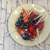 Tootsie Pop · A Tootsie Pop is a hard candy lollipop filled with the chocolate-flavored chewy Tootsie Roll...