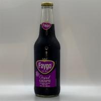 Faygo Grape · The dark purple liquid gives a tiny hiss upon opening and a sizzle to the pour that settles ...