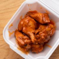 8Pc Chicken Wings Tossed And Sauced  · Traditional bone in Wings served naked and tossed in your choice of sauce