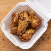 16Pc Chicken Wing Tossed And Sauced  · Traditional bone in Wings served naked and tossed in your choice of sauce