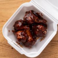 12Pc Chicken Wing Tossed And Sauced  · Traditional bone in Wings served naked and tossed in your choice of sauce