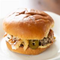 Jalapeno Popper Burger · A favorite snack done right! A generous portion of cream
cheese spread, sautéed
jalapeños, c...