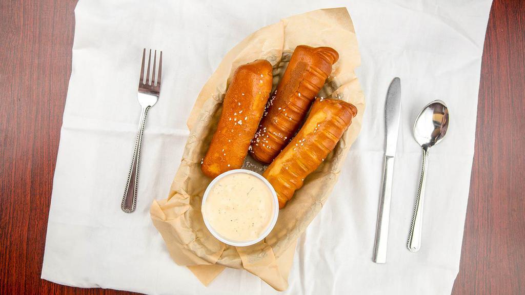 Pretzels & Beer Cheese · Soft Bavarian style pretzel sticks
served with a side of Mr. Brews homemade beer cheese dip.