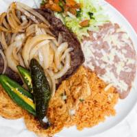 House Especial · Authentic carne asada (steak) and grilled chicken with fried onions. Served with rice, refri...