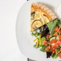 Quiche & Salad Combo · Slice of quiche with a small green salad.