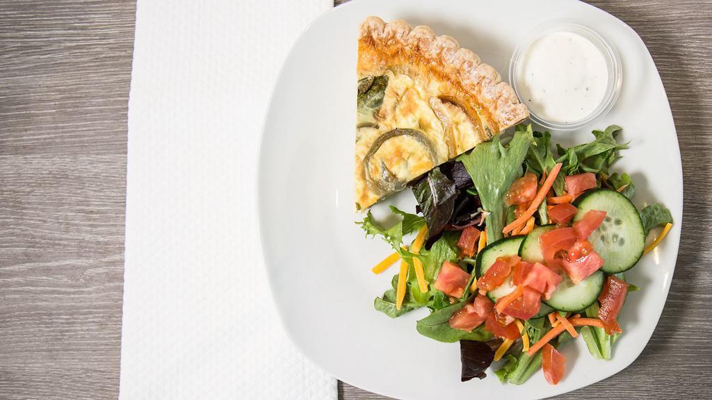 Quiche & Salad Combo · Slice of quiche with a small green salad.