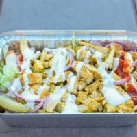 Chicken Shawarma Salad (Small) · Chicken Shawarma Salad: Greek salad topped with chicken shawarma meat, served with hot pita ...
