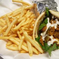 Chicken Shawarma Sandwich · Marinated white chicken strips with lettuce, tomatoes, onions and pickles with garlic sauce,...