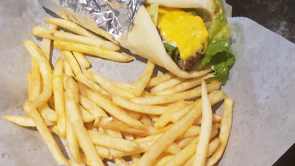 Cheeseburger · Angus ground beef with lettuce, tomatoes, onions, mayo and pickles, wrapped in a hot pita bread.