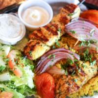 Chicken Tawook · Charbroiled chicken breast cubes seasoned in our special blend of spices to perfection, serv...