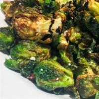 Crispy Sprouts · Vegetarian. Crispy fried brussel sprouts with fried onions, walnuts, and Bleu cheese drizzle...