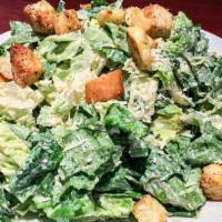 Caesar Salad · Crisp romaine lettuce and house made croûtons tossed in our caesar dressing then topped with...