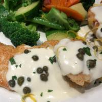 Chicken Piccata Lunch · Sautéed chicken breast topped with lemon-butter sauce with mashed potatoes and vegetable du ...