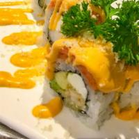 Passion · Hot. Shrimp tempura, cream cheese, avocado top with spicy tuna and crunch.