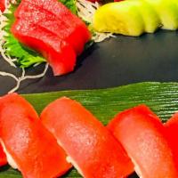Supreme Tuna · Five pcs sushi, nine pcs sashimi with one tuna roll. * 
 
*New!