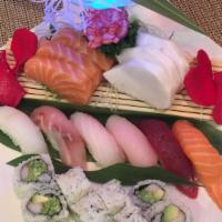 Sushi And Sashimi Combination Platter · 6 pieces of chef's choice sushi, 9 pieces of chef's choice sashimi and a California roll. Se...