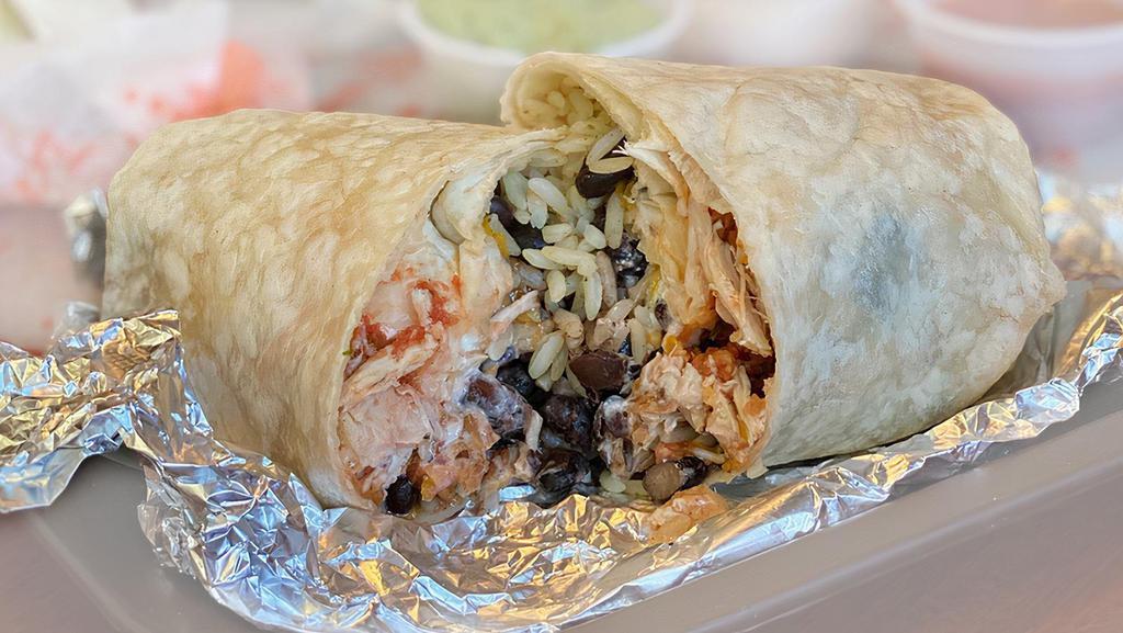 Grande Chicken · Wrapped in a large flour tortilla, rice, black beans, seasoned grilled chicken, sour cream, cheese, and salsa.