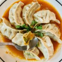 Alu Momo (8) · Eight pieces of made from scratch momos steamed dumpling stuffed with seasoned potatoes serv...