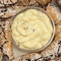 Cannoli Dip For More · Alot of our broken cannoli shells topped with powdered sugar and generous amount of cannoli ...
