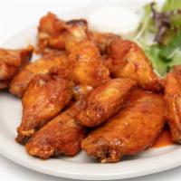 House Wings · Smoked in house then fried to crispy perfection. tossed in any of our wing sauces or dry rub...