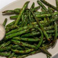 Szechwan Green Beans · Pan-seared fresh green beans lightly coated with seasonings and szechwan sauce served with P...