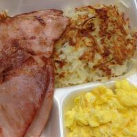Grand Slam Breakfast · 2 XL EGGS,  HAM, SAUSAGE and BACON, 2pc of PANCAKE, HASH BROWNS or GRITS
