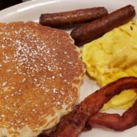 Pancakes Combo · Two pancakes, two eggs (any style) and two strips of bacon, two sausage links or patties.