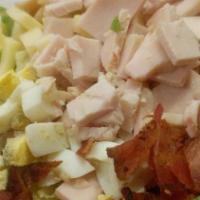 Cobb Salad · A salad platter topped with chicken, turkey or tuna, choice of cheese, bacon, tomato, carrot...