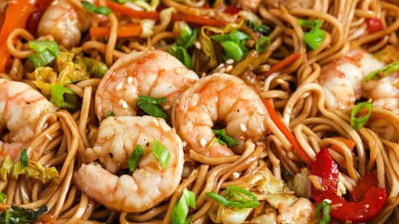 Shrimp Lo Mein · Egg Noodles, shredded carrot, baby bok  choy, bean sprout, yellow onions and green onion.