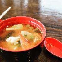Seafood Soup · Green mussel, salmon, crab meat, shrimps, miso soup base.