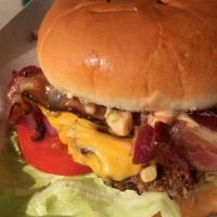 The Bacon Cheeseburger · Tyner Pond Farm beef meets Tyner Pond Farm pork. A 1/4 lb. of pasture-raised beef topped wit...