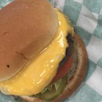 The Two & Change Burger · Basic but brilliant. A pasture-raised, all-beef patty topped with American cheese, pickles, ...