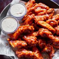 Boneless Wings · Boneless house breaded chicken wings tossed in your choice of wing sauce. Comes with a side ...