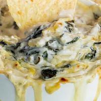 Spinach & Artichoke Dip · homemade artichoke & cheese dip served with tortilla chips