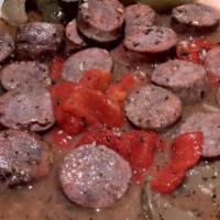 Sausage & Peppers · Our Homemade Italian Sausage with Red and Green Peppers in Sauce.