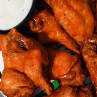 Buffalo Wings (Mild) · premium wings, cooked to perfection and smothered in mild Buffalo sauce (approx. 7 wings per...