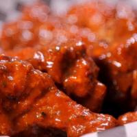 Wings (Sweet Thai Chili) · premium wings, cooked to perfection and smothered in sweet Thai chili sauce (approx. 7 wings...