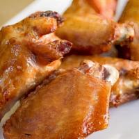Wings (Plain - Naked) · premium wings, cooked to perfection and served with your choice of sauce on the side (approx...