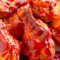 Wings (Bbq) · premium wings, cooked to perfection and smothered in BBQ sauce (approx. 7 wings per serving)
