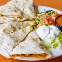 Grilled Steak Quesadilla · Flour Tortilla Stuffed with Grilled Steak, Cheese Red Peppers, Mushrooms, & Onion