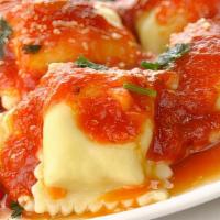 Ravioli · our homemade ravioli stuffed with your choice of (meat or cheese) topped with marinara

incl...