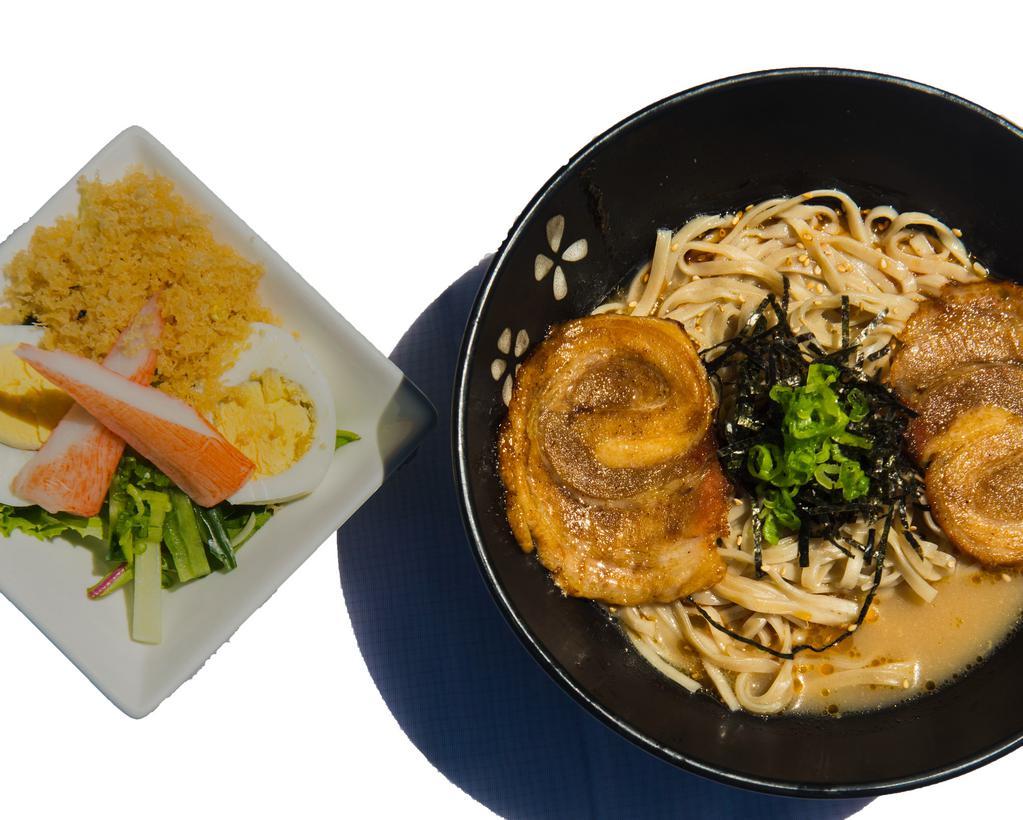 Pork Ramen · Cha-shu pork, handmade ramen noodles, 12-hour chicken broth, seasoned egg tempura flakes, cucumber, kizami nori, spicy sesame oil, scallions, sesame seeds, shredded crab