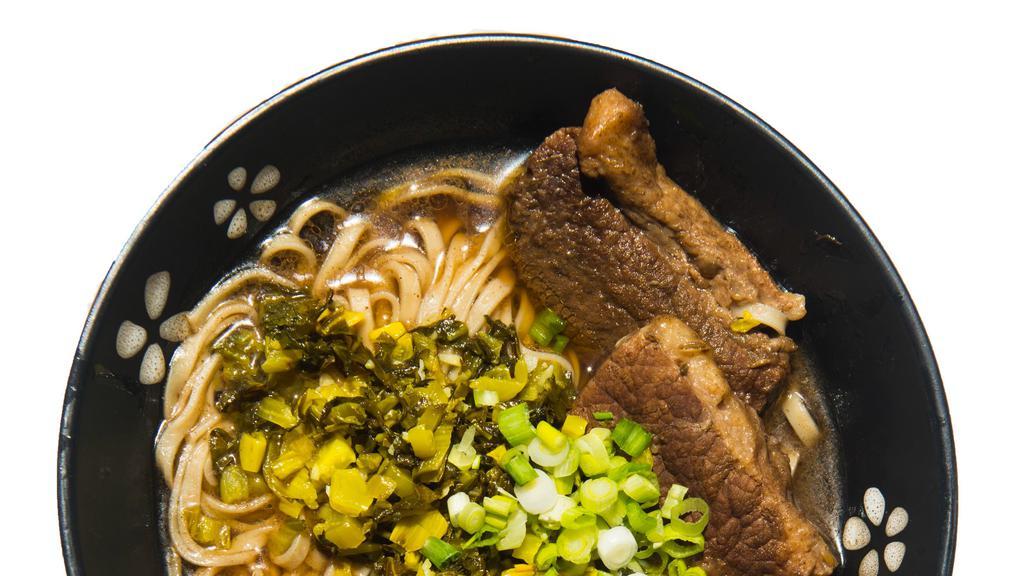 Beef Ramen · Cha-shu beef, handmade ramen noodles, 12-hour beef broth, scallions, spicy sesame oil, fried sour pickes