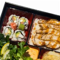 Chicken Bento · steamed rice topped with thinly sliced chicken and tender onion simmered in a sweet and savo...