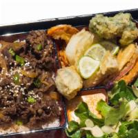 Beef Bento · Steamed rice topped with thinly sliced beef and tender onion, simmered in a sweet and savory...