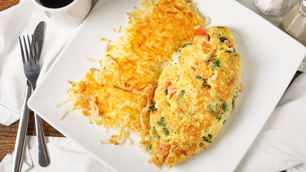 Egg Beater House Special Omelette · Chunks of grilled chicken, feta cheese, spinach and tomato.